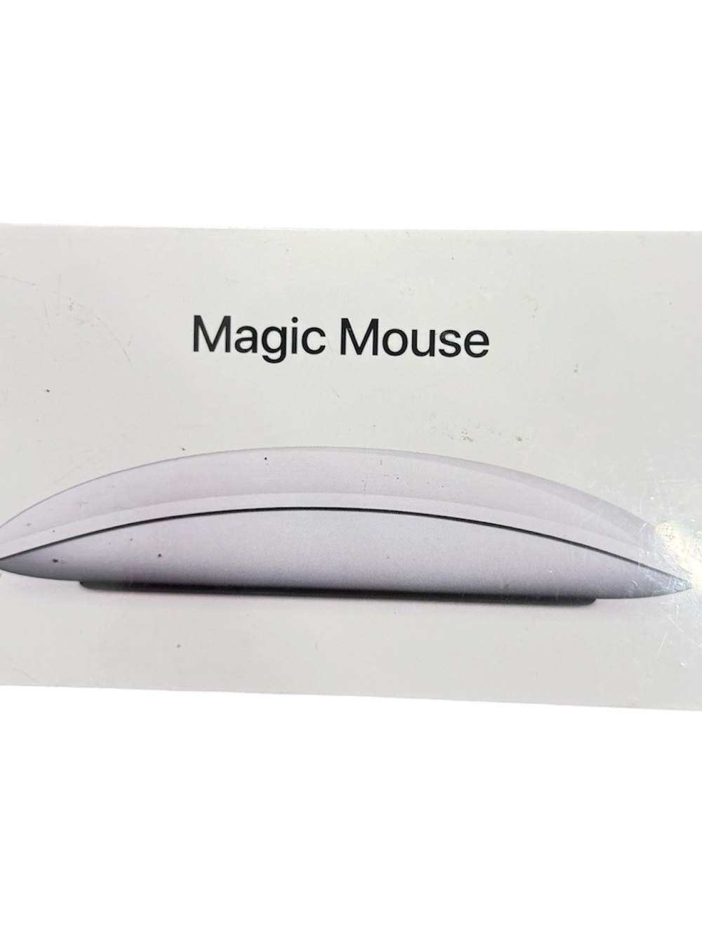 Apple Wireless Magic Mouse in White and Silver with Black Feet